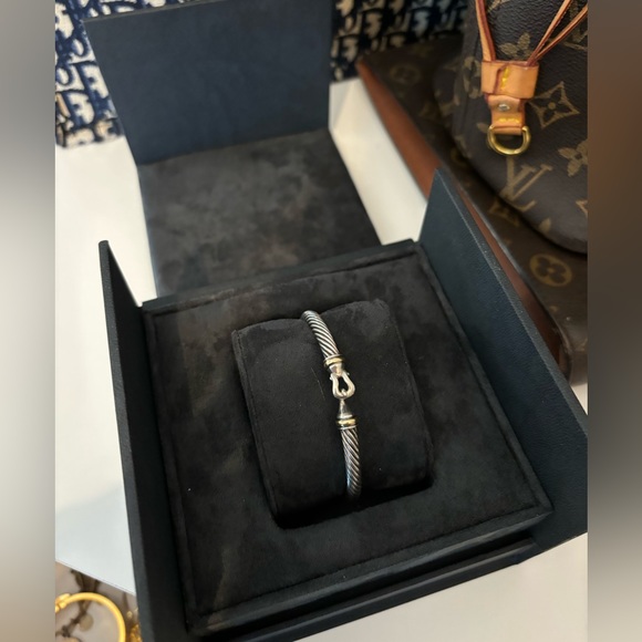 David Yurman Buckle Cable Bracelet
Sterling Silver with 18K Yellow Gold, 5mm - Picture 2 of 5